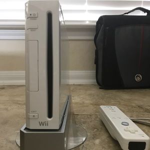 Selling a Wii for $140 with a remote!